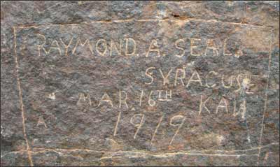 Raymond A. Seal scratched his name into a flat face of the Rock in 1919. Copyright 2006 by Leon Unruh.
