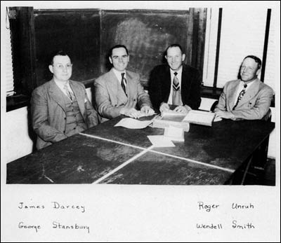 Members of the Pawnee Rock Board of Education appeared in the 1950 yearbook. They are, from left: James Darcey, Roger Unruh, George Stansbury, and Wendell Smith.