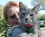 Cheryl Unruh and one of her beloved cats.