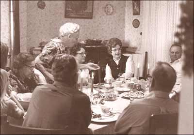 Dinner at Lena Unruh's farmhouse near Pawnee Rock, probably 1974. Photo copyright 1974 by Leon Unruh.