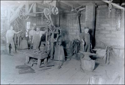 Dutch Smith and employees in his blacksmith shop in Pawnee Rock.