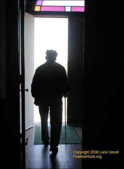 Elgie Unruh walking out the door at St. Paul's Lutheran Church at the Barton County Historical Museum. Photo copyright 2008 by Leon Unruh.
