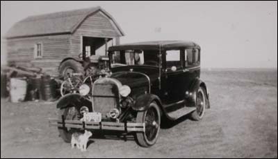 Elgie Unruh's Ford Model A in the 1940s on the family farm. Photo copyright 2006 by Elgie Unruh.