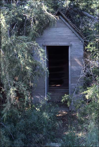 Outhouse on Otis and Lena Unruh's farm, 1981. Photo copyright 2008 by Leon Unruh.