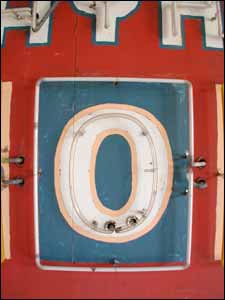 The O in the old Jayhawker Motel sign, now in the Barton County Historical Museum. Copyright 2005 by Leon Unruh.