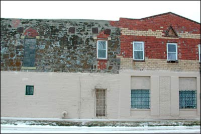 The Knights of Pythias met in the top floor of the old opera house. The lodge's triangular logo was built into the brickwork. Photo copyright 2005 by Leon Unruh.