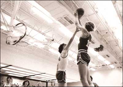 Mark Smith shooting the basketball. Macksville HS vs Skyline HS at Skyline, 1975. Photo copyright 1975 by Leon Unruh.