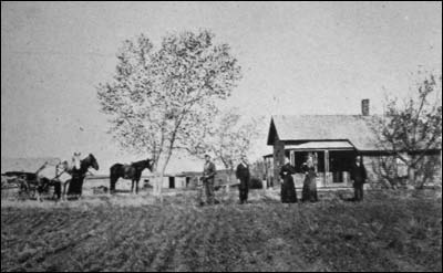 Tobias McGill farm, a mile west of Dundee. George McGill, Crandon McGill, Farilla McGill, Elva McGill, and Tobias McGill.