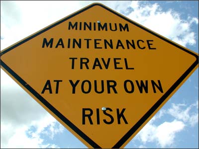 Minimum maintenance sign. Photo copyright 2008 by Leon Unruh.