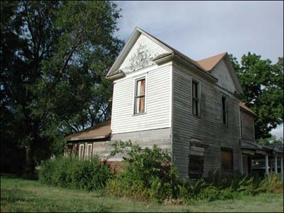 The former Zieber house, later inhabited by a number of families. Photo copyright 2003 by Leon Unruh.