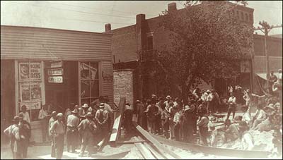 A crew builds an apparatus to pump water out of a basement. Don Ross sent this image.