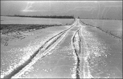Country road near Pawnee Rock after snowfall in the 1970s. Photo copyright 2013 by Leon Unruh.