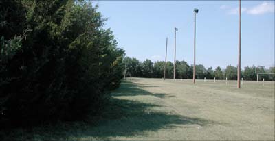 The Pawnee Rock school track, now covered with grass. Photo copyright 2002 Leon Unruh.