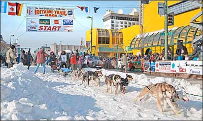 Frank Sihler starts the Iditarod Trail Sled Dog Race in downtown Anchorage on March 3, 2007. Photo copyright 2007 by Leon Unruh.