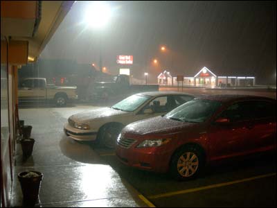Heavy rain along West 10th Street in Great Bend, August 14, 2006. Photo copyright 2006 by Leon Unruh.