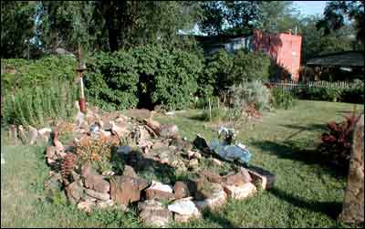 Rock garden behind our house in Pawnee Rock. Photo copyright 2005 by Leon Unruh.