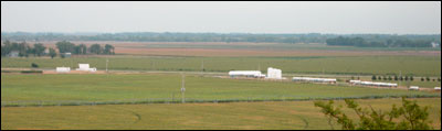 The Farmers Grain anhydrous ammonia tanks and the Pawnee Rock sewer plant. Photo copyright 2007 by Leon Unruh.