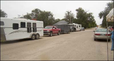 Horse trailers line up Monday in front of the Christian Church at Centre and Santa Fe, across from the city park, as the trail ride passed through Pawnee Rock. Photo copyright 2007 by Gary Trotnic.