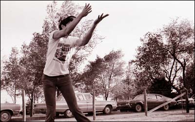 Greg Davidson plays volleyball. Photo copyright 1974 by Leon Unruh.