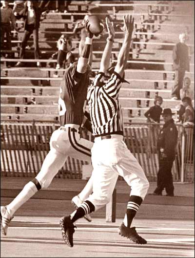 Waddell Smith scores a touchdown for the Kansas Jayhawks against the Colorado Buffaloes, 1975. Photo copyright 1975 by Leon Unruh.
