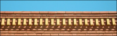 Bricks over the old drugstore. Photo copyright 2006 by Leon Unruh.
