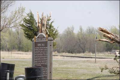 The wind snapped off a cedar at the Pawnee Rock historical marker on the southwest corner of town on the weekend of April 16-17, 2011. Jim Dye made this photo. Photo copyright 2011 by Jim Dye.
