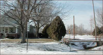 The footbridge over the drainage ditch next to Howard and Carole Bowman's house. Photo copyright 2005 by Leon Unruh.