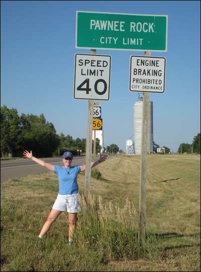 Cheryl Unruh at the city limit of Pawnee Rock, 2010. Photo copyright 2011 by Leon Unruh.