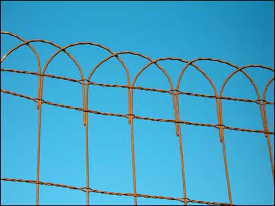 Wire fence around the Dundee Valley Cemetery, Dundee, Kansas. Photo copyright 2006 by Leon Unruh.