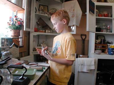 Sam Unruh meets the past in McCowan's Santa Fe Mercantile in Pawnee Rock. Copyright 2006 Leon Unruh.