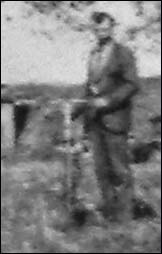 George McGill with bike, about 1912.