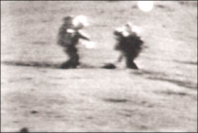 Two Apollo astronauts on the moon, photographed on our TV set. Copyright 1972 by Leon Unruh.
