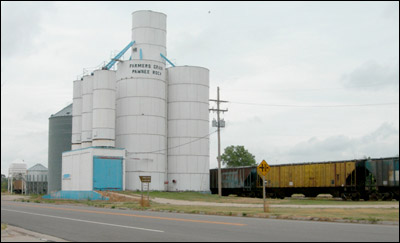 Old Farmers Grain steel-bin elevator south of U.S. 56 in Pawnee Rock, August 2006. Photo copyright 2007 by Leon Unruh.