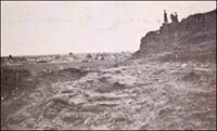 Pawnee Rock and the town of Pawnee Rock, from an early 20th-century postcard. Click on the photo to go to the gallery page.