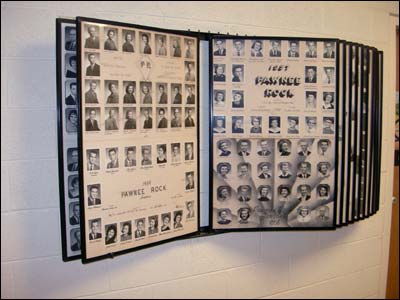 Pawnee Rock High School alumni photos in the former school. Photo copyright 2009 by Leon Unruh.