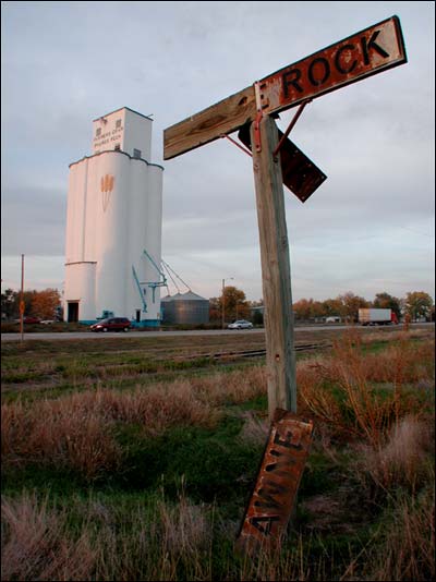 Pawnee Rock sign at the site of the former Santa Fe Railroad depot. October 2003. Photo copyright 2003 by Leon Unruh.
