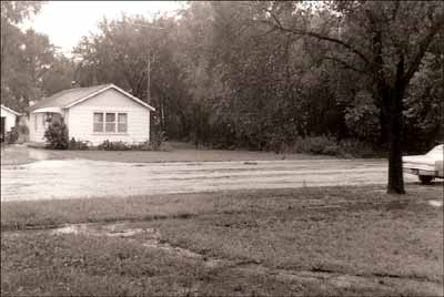 Rainy day in Pawnee Rock on Santa Fe Avenue. Photo copyright 2006 by Leon Unruh.