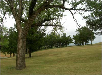 North face of Pawnee Rock State Park during the summer. Photo copyright 2006 by Leon Unruh.