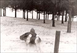 Sledding on Pawnee Rock. Photo copyright 2008 by Leon Unruh.