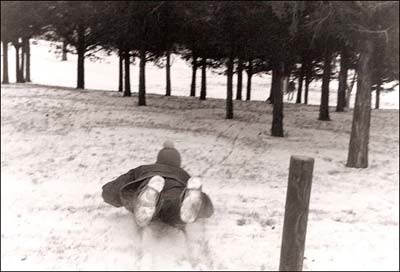 Sledding on Pawnee Rock. Photo copyright 2008 by Leon Unruh.