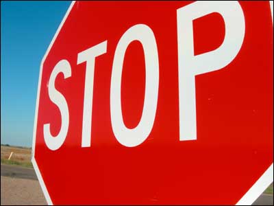 Stop sign north of Pawnee Rock. Copyright 2006 by Leon Unruh.