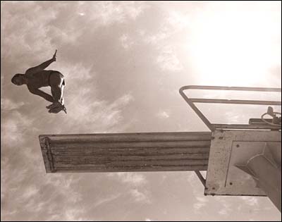 Walter Young on the diving board in Larned, Kansas, 1975. Photo copyright 1975 by Leon Unruh.