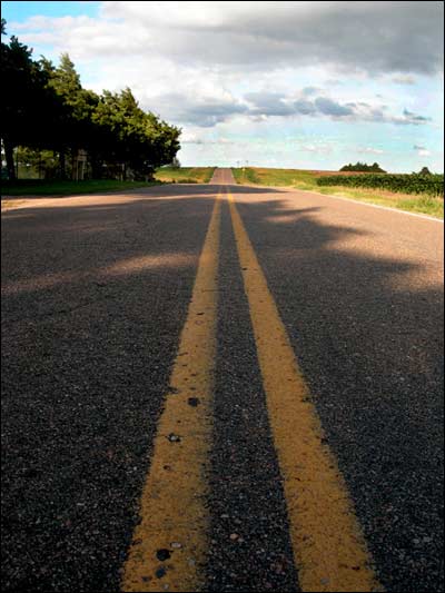 The road past the Pawnee Rock cemetery, looking east. Photo copyright 2007 by Leon Unruh.